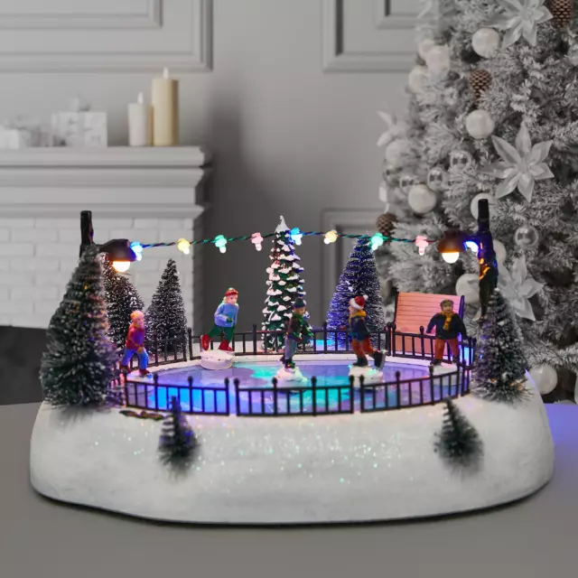 Композиция новогодняя светодиодная Дети на катке 27x20x13 см