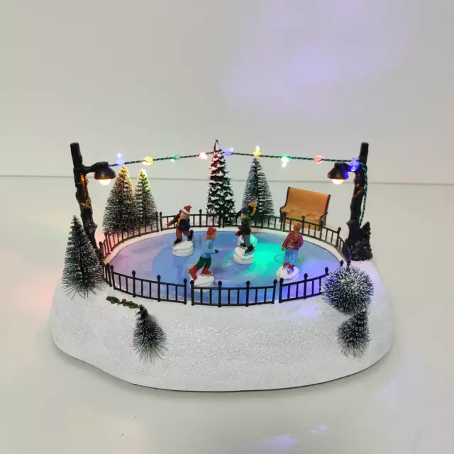 Композиция новогодняя светодиодная Дети на катке 27x20x13 см — изображение 8